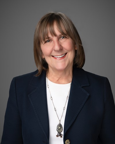 A picture of a woman smiling.